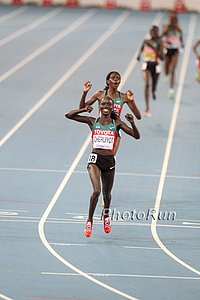 Sally Kipyego's happy in the back