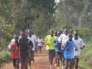 The lead gruop which includes 58:59 half-marathoner and 2:04:58 marathoner Wilson Kipsang Kiprotich who I think i the tall guy on the left in the white top and red stripes.
