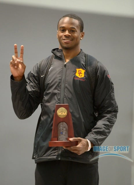 Mar 15, 2014; Albuquerque, NM, USA; Aaron Brown of Southern California poses on the awards podium after finishing fourth in the 60m in the 2014 NCAA Indoor Championships at Albuquerque Convention Center.