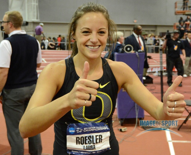 Mar 15, 2014; Albuquerque, NM, USA; Laura Roesler celebrates after Oregon won the womens 4 x 400m relay in a collegiate record 3:27.40 to clinch the team title in the 2014 NCAA Indoor Championships at Albuquerque Convention Center.