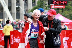 Ed Whitlock with Scotiabank Toronto Marathon race director Alan Brookes after finishing the 2012 race at age 81 (Photo Credit: Victah Sailer/Photo Run, used with permission)