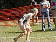 Finishing means a lot. Larson staggering after falling down. She would collapse again on the finishing mat.