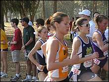 Many ladies including Lauren King (#248) of Notre Dame and Darja Vasiljeva (r.) of Minnesota