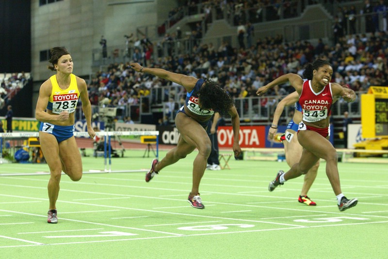 Perdita Felicien Edges Gail Devers for Gold