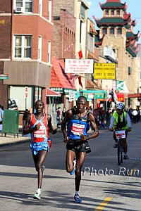 Cheruiyot-Mandago1a-#2A4063.jpg