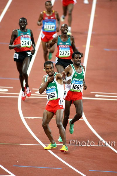 Bekele_KenenisaPose-#1C82CB.jpg