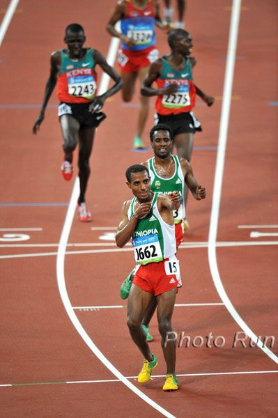 Bekele_KenenisaPose_#1C82CE.jpg