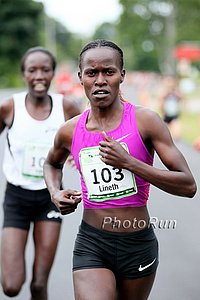 Lineth Chepkuri Pulling Away from Edna Kiplagat