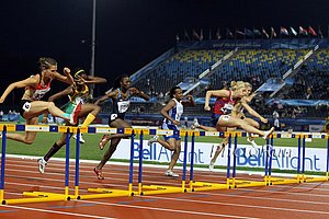 Norway's Isabelle Pederson leads Germany's Fletsch in the 100h final
