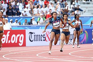 Collier to Bryant handoff in the girls 4x100 where the US girls won