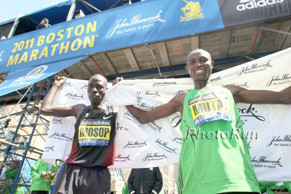 Moses Mosop 2:03:06 and Geoffrey Mutai 2:03:02