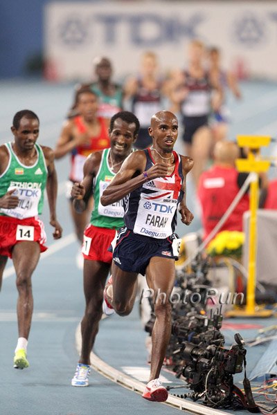 Merga and Jeilan trying ty stay close at start of last lap