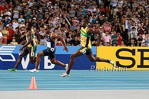 Walter Dix (l) and Usain Bolt (r)