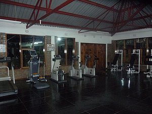 Lornah's place has an unreal weight room and that's where I met Edna Kiplagat and Gilbert Koech.