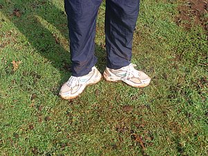 Relying on used shoes with holes in them. Thankfully LetsRun.com was there to give him some dough so he could purchase some 'new' (used) shoes.