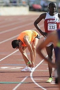 German Fernandez Fixing His Shoe After the Race