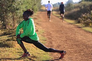 Mary Keitany Stretching