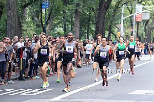 Lagat Takes Lead