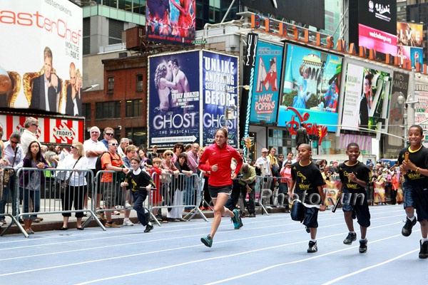 Desi Davila Races Kids in Times Square
