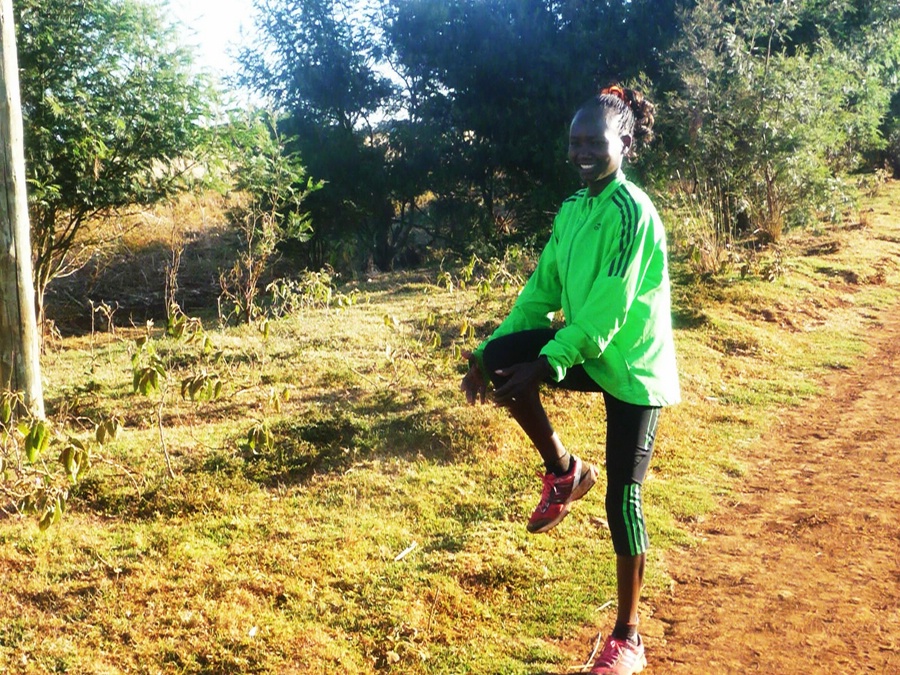 Mary Keitany Stretching