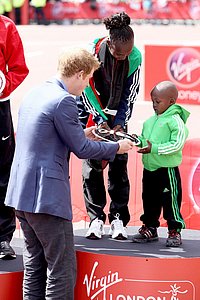 Prince Harry Gives Mary Keitany's Son an Award
