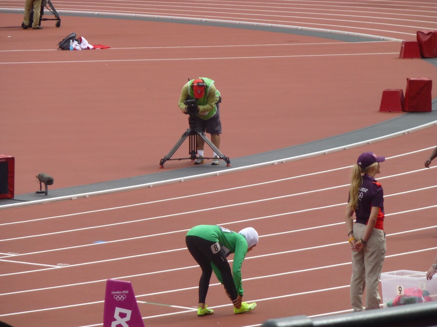 Sarah Attar Stretches Before Her Race