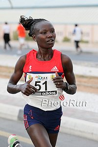 Keitany wih the Special adidas Grete Waitz Jersey