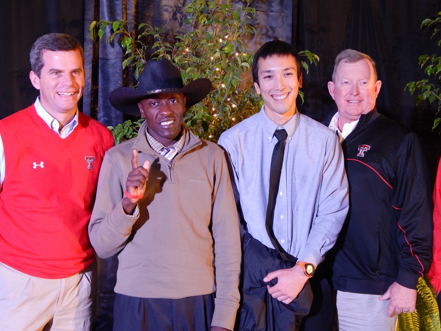 Kennedy Kithuka (cowboy hat) and Texas Tech
