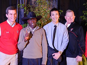 Kennedy Kithuka (cowboy hat) and Texas Tech
