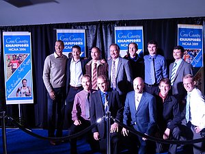 BYU posing with Josh Rohatinsky's picture (far left)