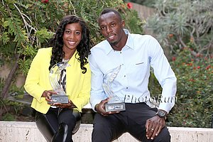 Shelly Ann Fraser Pryce con Usain Bolt