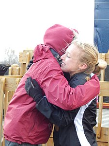 Providence's #1 Emilly Sisson (r) hugs Colleen Quigley