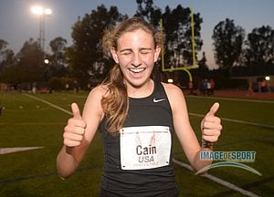 Mary Cain celebrates after setting an American junior record of 4:04.62