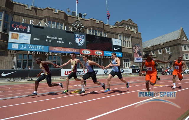 General view of the handoff in a college mens 4 x 100m relay heat