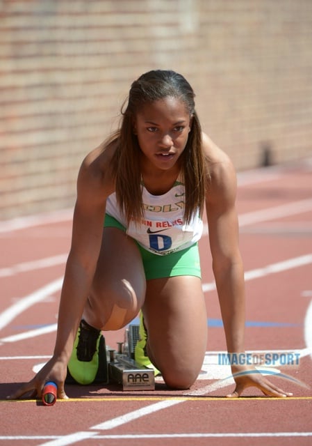 Jade Lewis of Long Beach Poly in the starting blocks of the Championship of America girls 4 x 100m relay at Penn