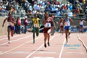 Ashley Collier (A) runs the anchor leg on the Texas A&M womens 4 x 100m relay that won the Championship of America race in 43.05