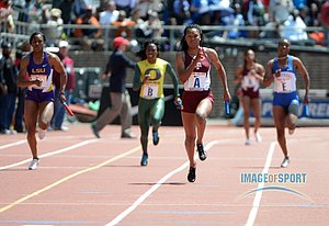 Ashley Collier (A) runs the anchor leg on the Texas A&M womens 4 x 100m relay that won the Championship of America race in 43.05 in the 119th Penn Relays at Franklin Field.