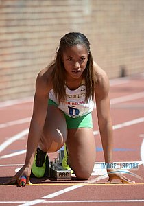 Jade Lewis of Long Beach Poly in the starting blocks of the Championship of America girls 4 x 100m relay at Penn