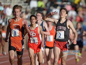 Max Norris of Harriton (2) celebrates after defeating Stephen Shine of Briarcliff (8) to win the championship boys 3,000m, 8:25.62 to 8:25.87, in the 119th Penn Relays at Franklin Field.