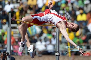 Derek Drouin of Indiana wins the college high jump championship in a meet record 7-7 3/4 (2.33m)