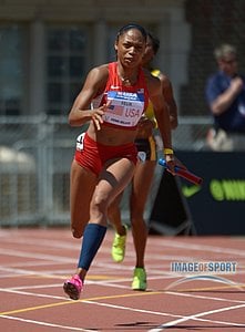 Allyson Felix runs the second leg on the USA Red womens 4 x 100m relay.