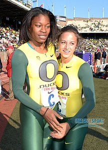 Phyllis Francis of Oregon (left) is congratulated by teammate Laura Roesler after running the anchor leg on the Ducks womens 4 x 400m relay that set a Championship of America meet record of 3:26.73.