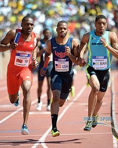 Lalonde Gordon (TRI), Joey Hughes (USA) and Wesley Neymour (BAH) run the anchor leg in the USA vs The World 4 x 400m relay