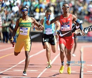 Tony McQuay of the USA Red team holds off Errol Nolan (JAM) on the anchor of the USA vs The World 4 x 400m relay, 3:00.91 to 3:01.15.