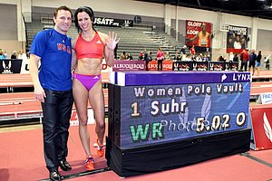 Jenn and Husband and Coach Rick Suhr Celebrate