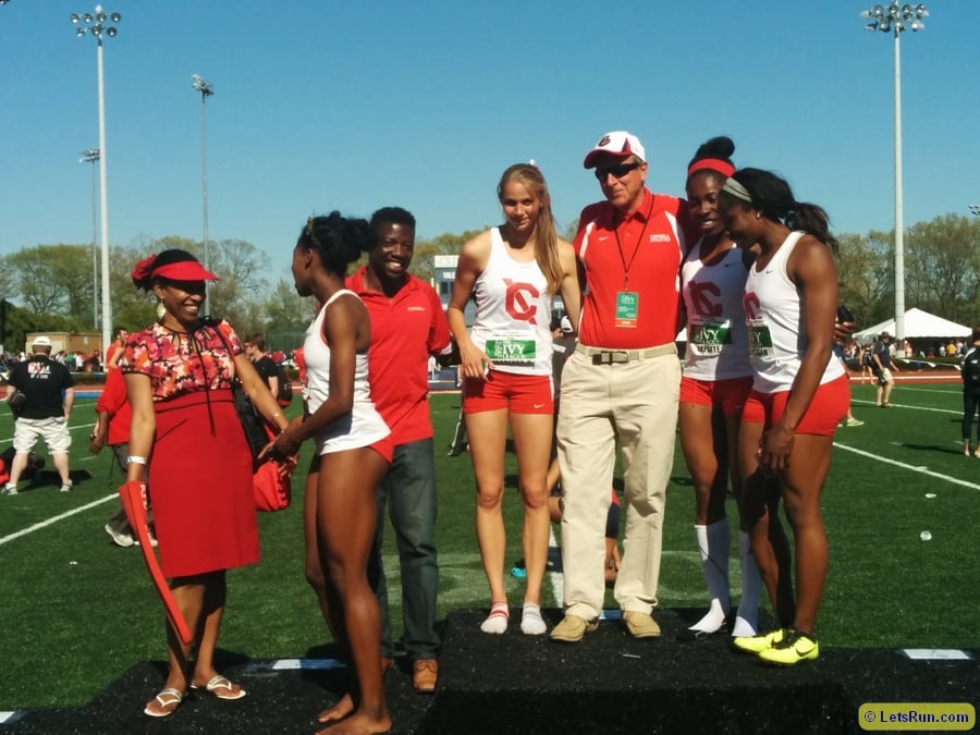 Cornell's victorious women's 4 x 400 with coaches Adrian Durant and RIch Bowman