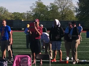 Celebrity citing: NBC announcer Chris Collinsworth films the Harvard celebration