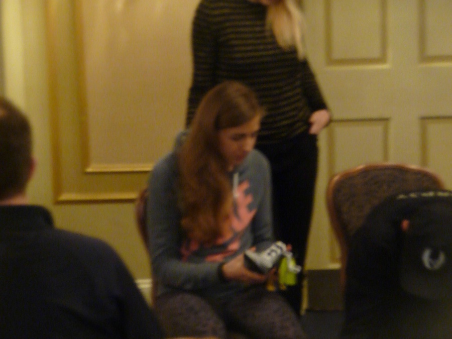Mary Cain Inspecting Some Nikes
