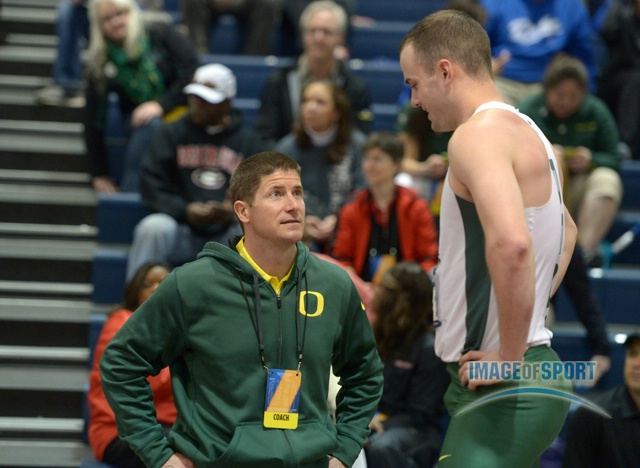 Oregon Ducks combined events coach Jamie Cook (left) talks with Dakotah Keys