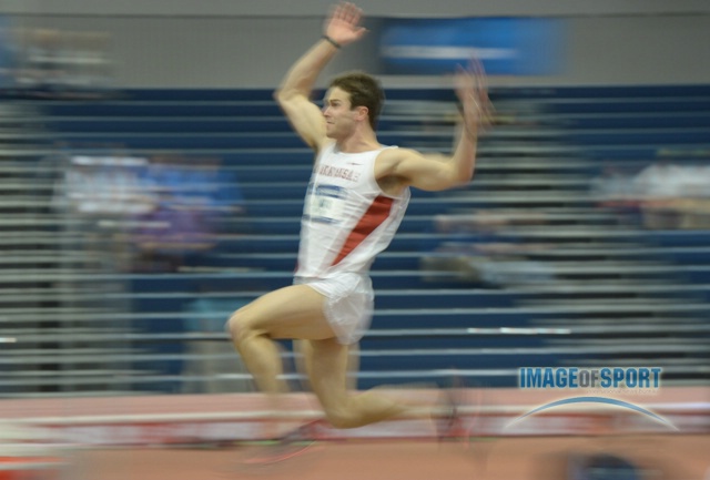 Kevin Lazas of Arkansas clears 6-6 3/4 (2.00m)
